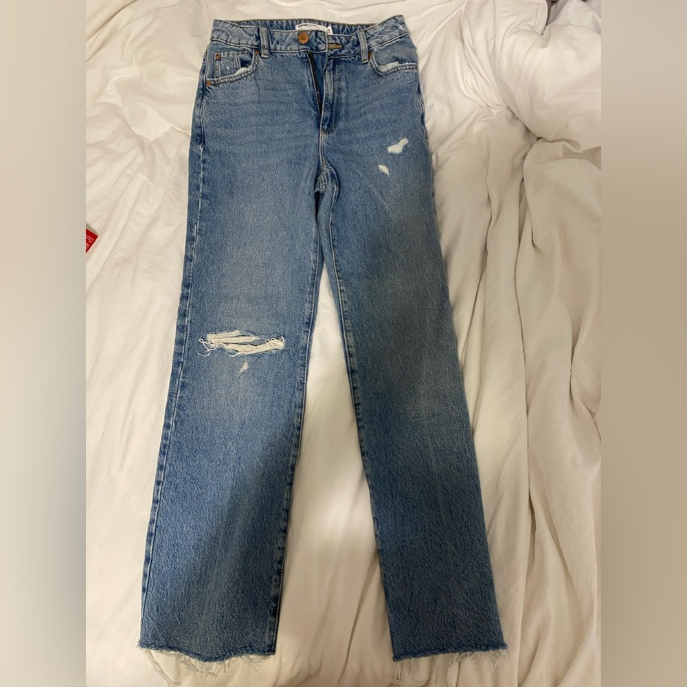 Garage blue jeans. Size 27. Straight/wide leg fit.